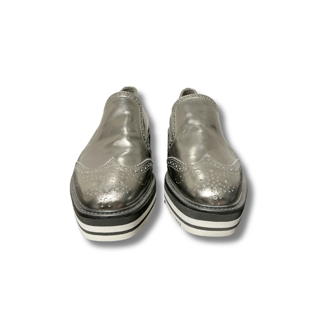 Prada Wingtip Platform Loafers