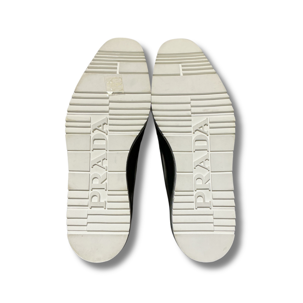 Prada Wingtip Platform Loafers